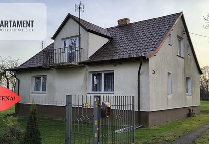 Dom z zabudowaniami na działce 1,24 ha