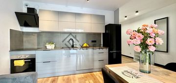 Modern flat  /browary wrocławskie/with the garden
