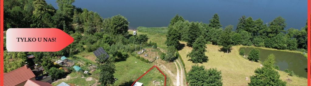 Działka nad jeziorem raciąskim z domkiem.