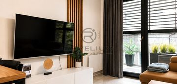 Nowoczesny apartament|miejsce postojowe|inwestycja
