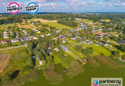 Działka z linią brzegową jeziora! tuchom.