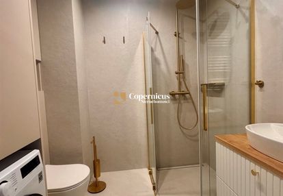 Nowocześnie wykończony apartament z ogródkiem