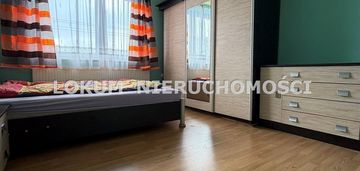 Dom z dużą działką i budynkiem gospodarczym