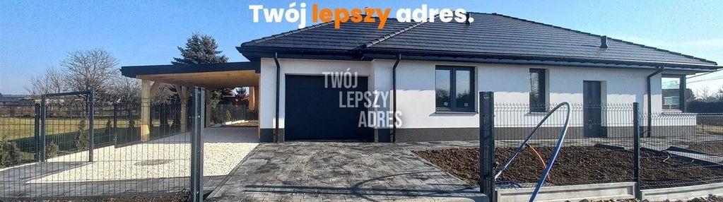 Parterowy,wolnostojący dom z garażem i wiatą
