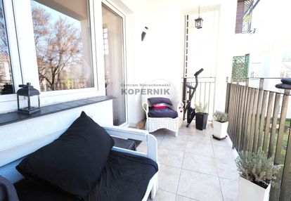 Kołłataja,  cegła,duży balkon,garaż