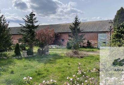 Łeknica, działka bud./inwest. z budynkiem gosp.