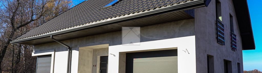 Nowoczesny dom w stanie surowym zamkniętym