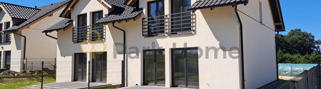 Dom w zabudowie bliźniaczej z garażem