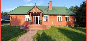 Dom z piękną działką - oaza spokoju i prywatności.