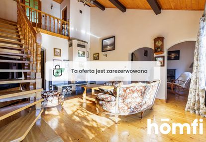 Dom z ogrodem, basenem i kominkiem w wawrze,