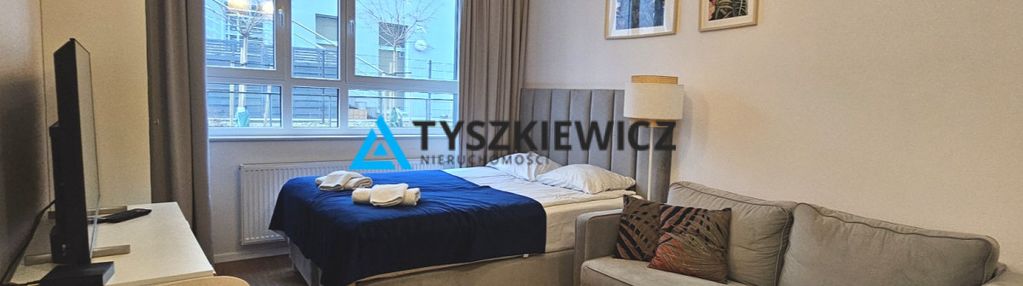 Funkcjonalna kawalerka siłownią przy skm
