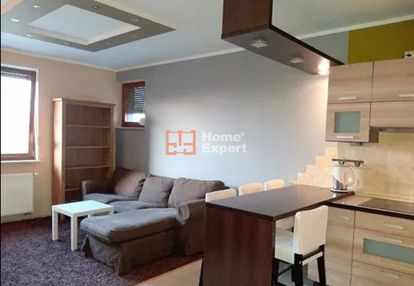 2 pokoje, aneks, miejsce postojowe w garażu