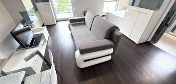 Apartament - salon z aneksem sypialnym, kuchnia