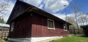 Ruszelczyce drewniany dom siedlisko na wsi