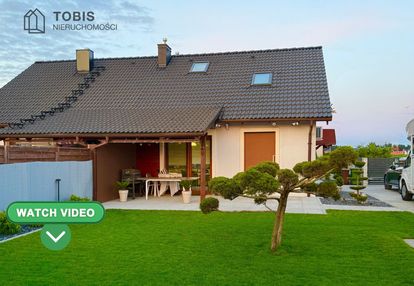 Piekny dom w kamionkach w zabudowie bliźniaczej