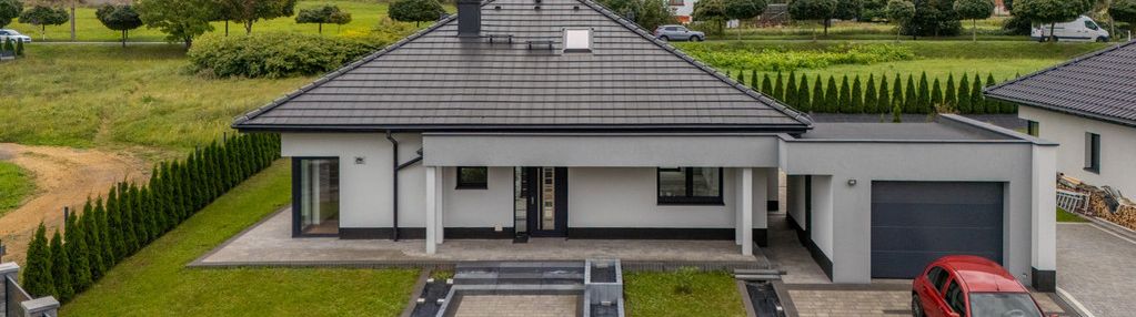 Dom parterowy i wolnostojący i 100m2 + garaż