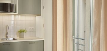 Kameralna kawalerka w centrum poznania