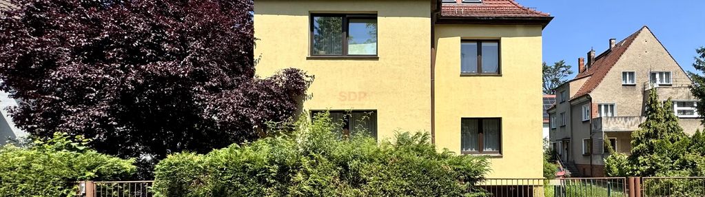 Przedwojenny dom z ogrodem przy parku biskupińskim