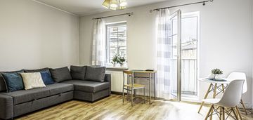 Poznań centrum duża kawalerka z balkonem