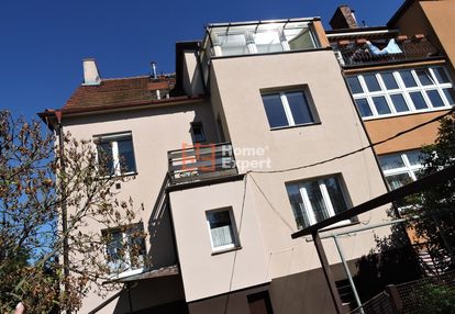 Mieszkanie dwupoziomowe z ogrodem i garażem