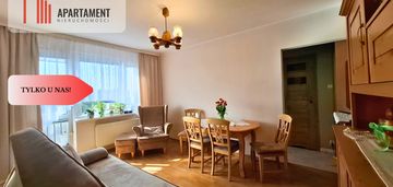 Słoneczna kawalerka z wnęką na błoniu