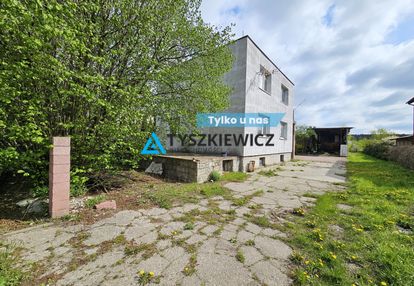 Dom mieszkalny z budynkami pod usługi.