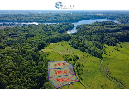 Enklawa otoczona lasem z dostępem do jeziora.