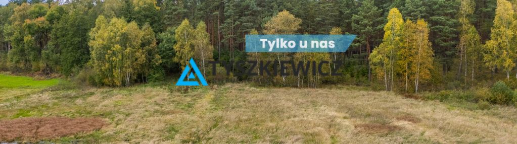 Łąka w cichej i spokojnej okolicy/krzyż