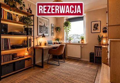 Dwupoziomowe mieszkanie z tarasem i balkonem.