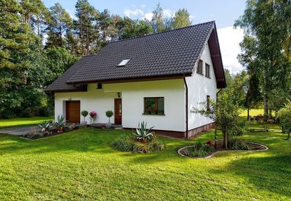 Gotowy do zamieszkania dom w otulinie zieleni na działce 7432 m2
