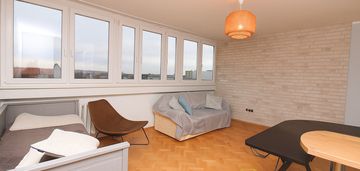 Jasna kawalerka z windą, 34 m² – przy sky tower