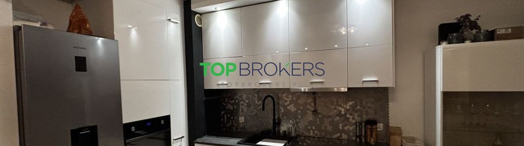 Salon z aneksem i dwie sypialnie, dwa garaże,metro