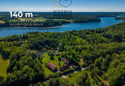 Dwa domy, z linią brzegową, nad jez. szeląg wielki