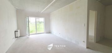 2 pokoje z ogrodem 84m2 i tarasem na dachu budynku