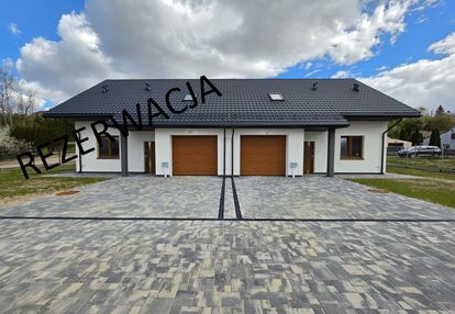 Nowy dom w zabudowie bliźniaczej z garażem i widokiem na łomżę i narew