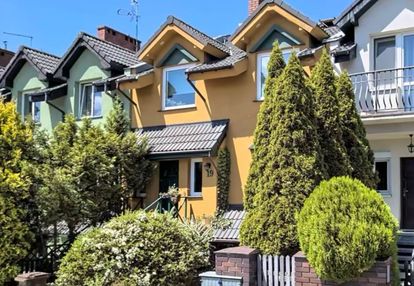 Dom strzeszyn w zabudowie szeregowej