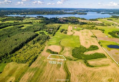 Działka z pywatną plażą nad jeziorem narie