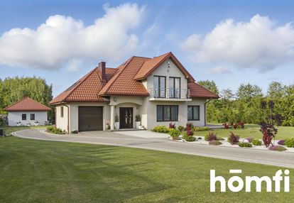 Rezydencja ze stawem w klwatach koło radomia