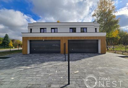 Połowa domu,178m2,podwójny garaż,5 pokoi