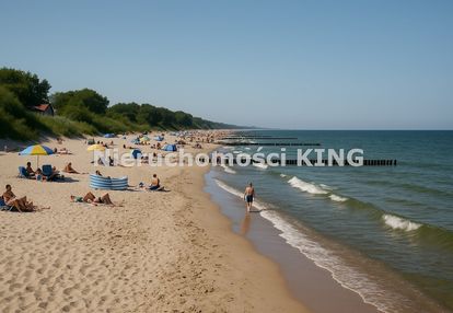 Działka z domkiem holenderskim nad morzem.