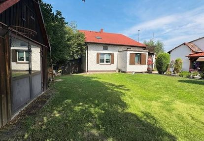 Dom z ogrodem, garażem i letnią kuchnią