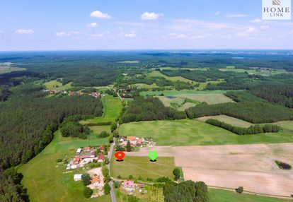 Działka w otoczeniu lasów, blisko miasta.