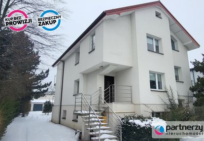 Dom podzielony na 2 mieszkania oraz dom w ogrodzie