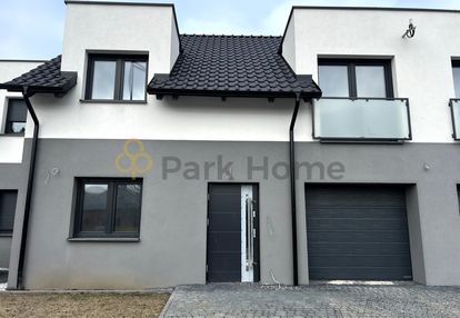 Dwupoziomowy lokal mieszkalny z ogródkiem. garaż.