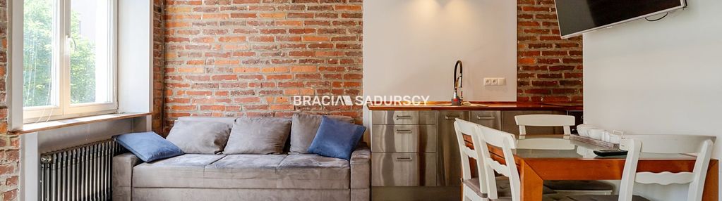 Dwupokojowy apartament z historycznym charakterem