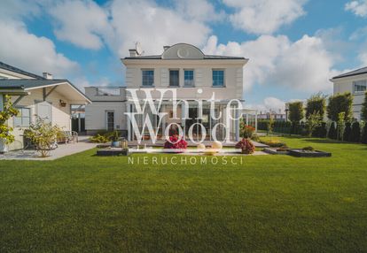 Komfortowa willa z ogrodem zimowym ogrody tesoro