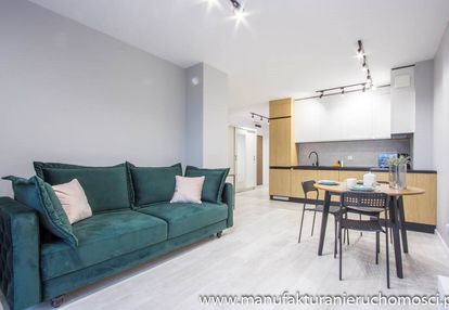 *kawalerka *apartamentowiec *m. postojowe*