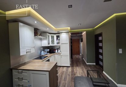 Mieszkanie z ogrodem w zielonych panewnikach