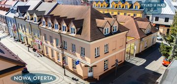Dwa budynki usługowo-mieszkalne w centrum