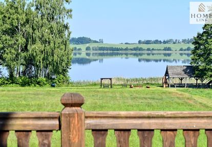 Olsztyn, dom z bala z linią brzegową
